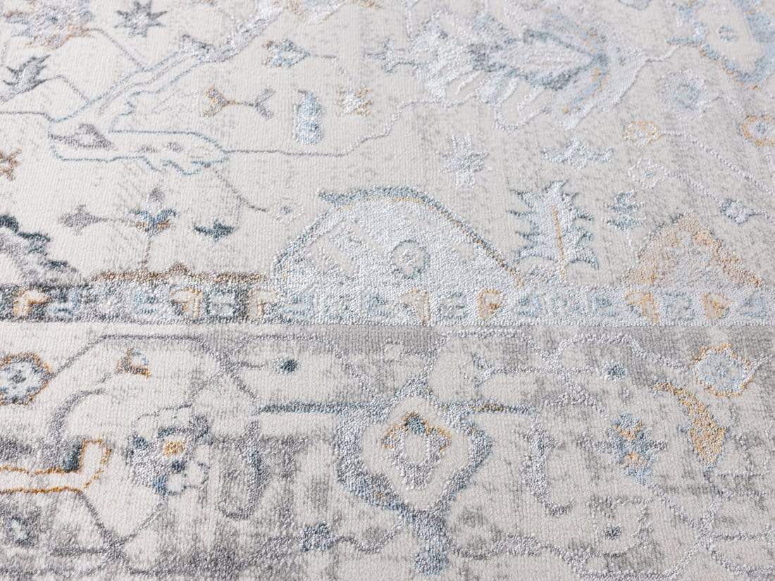 Evelyn Cream Blue And Tan Lustrous Traditional Rug