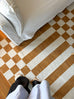 Alula Brown and White Checkered and Striped Rug