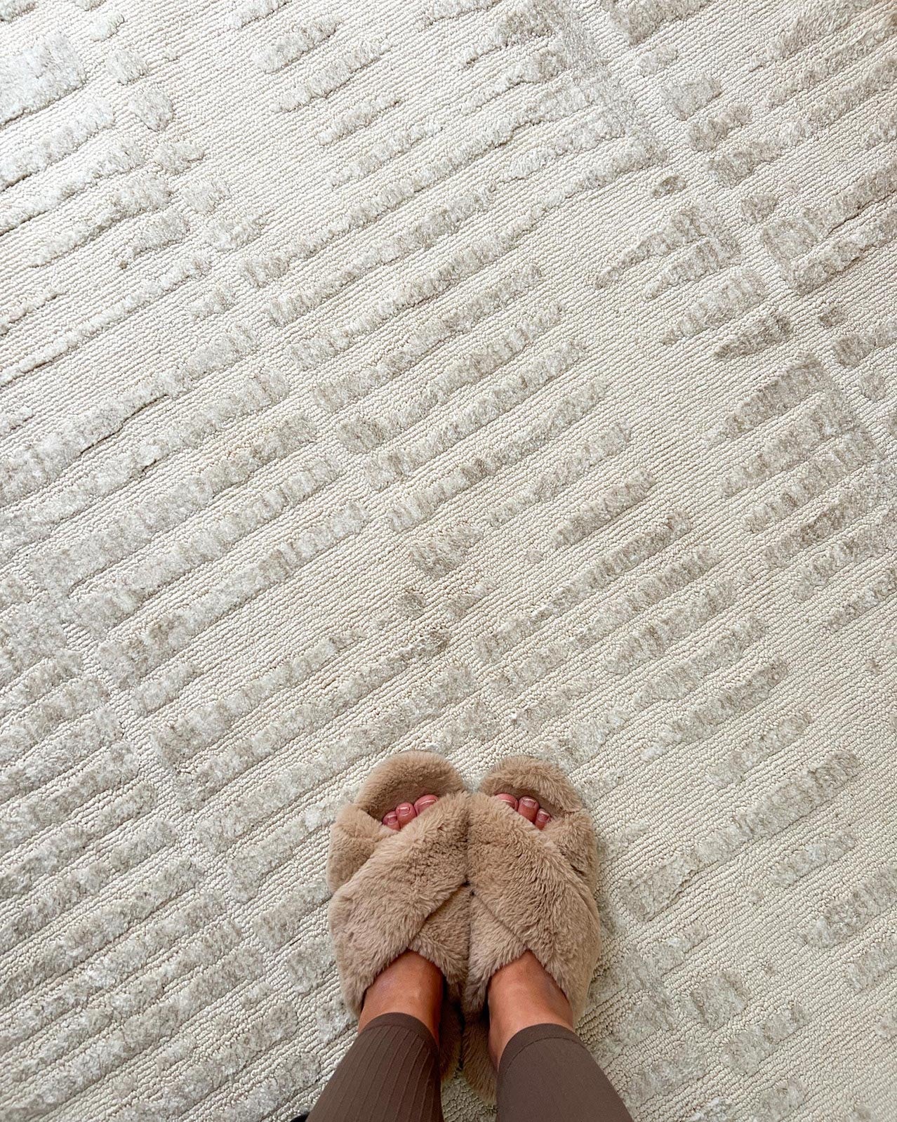 Nahba Ivory And Cream Textured Tribal Round Rug