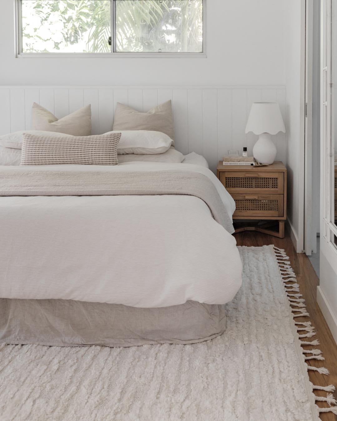 Serena Ivory Cream Textured Tassel Rug