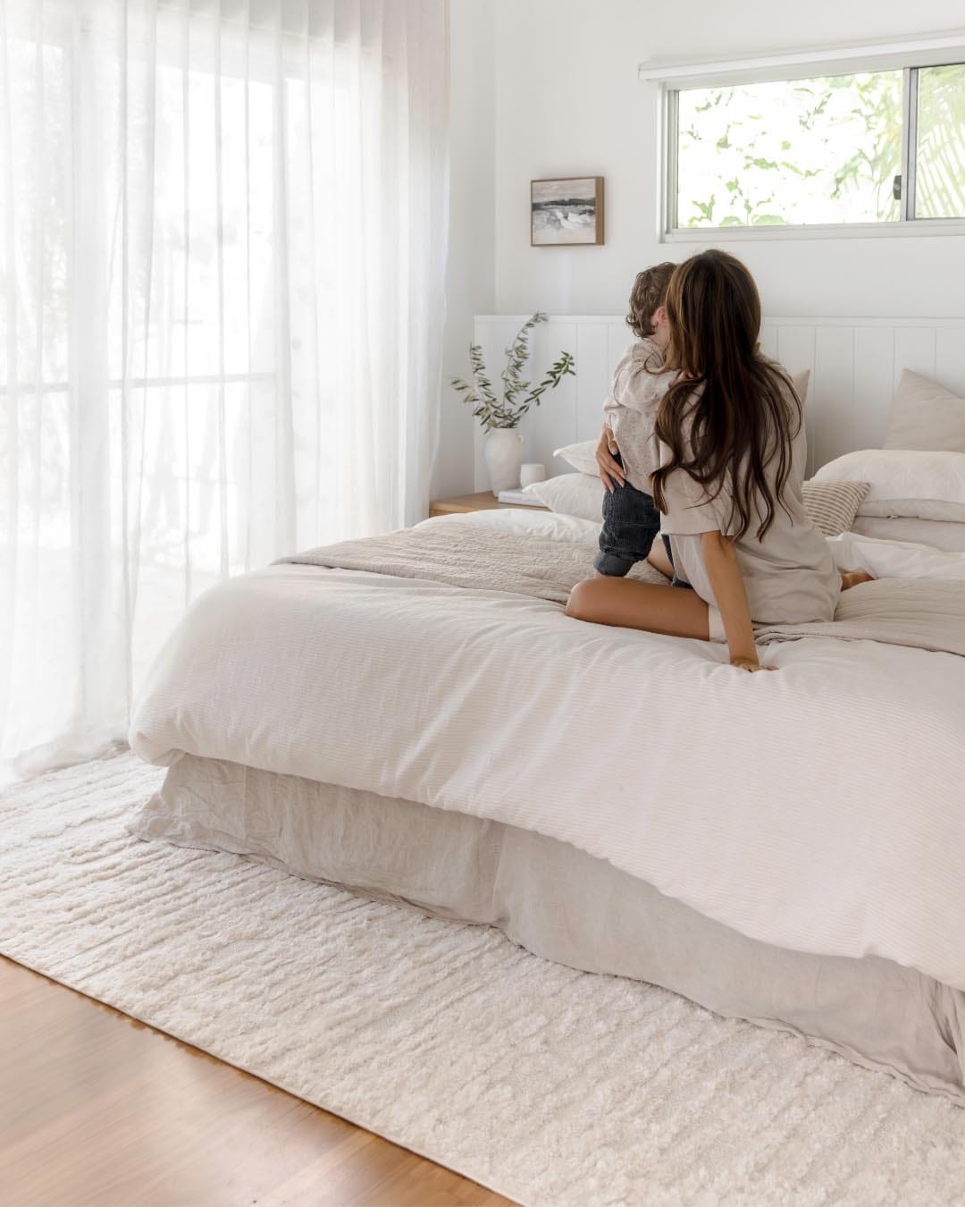Serena Ivory Cream Textured Tassel Rug