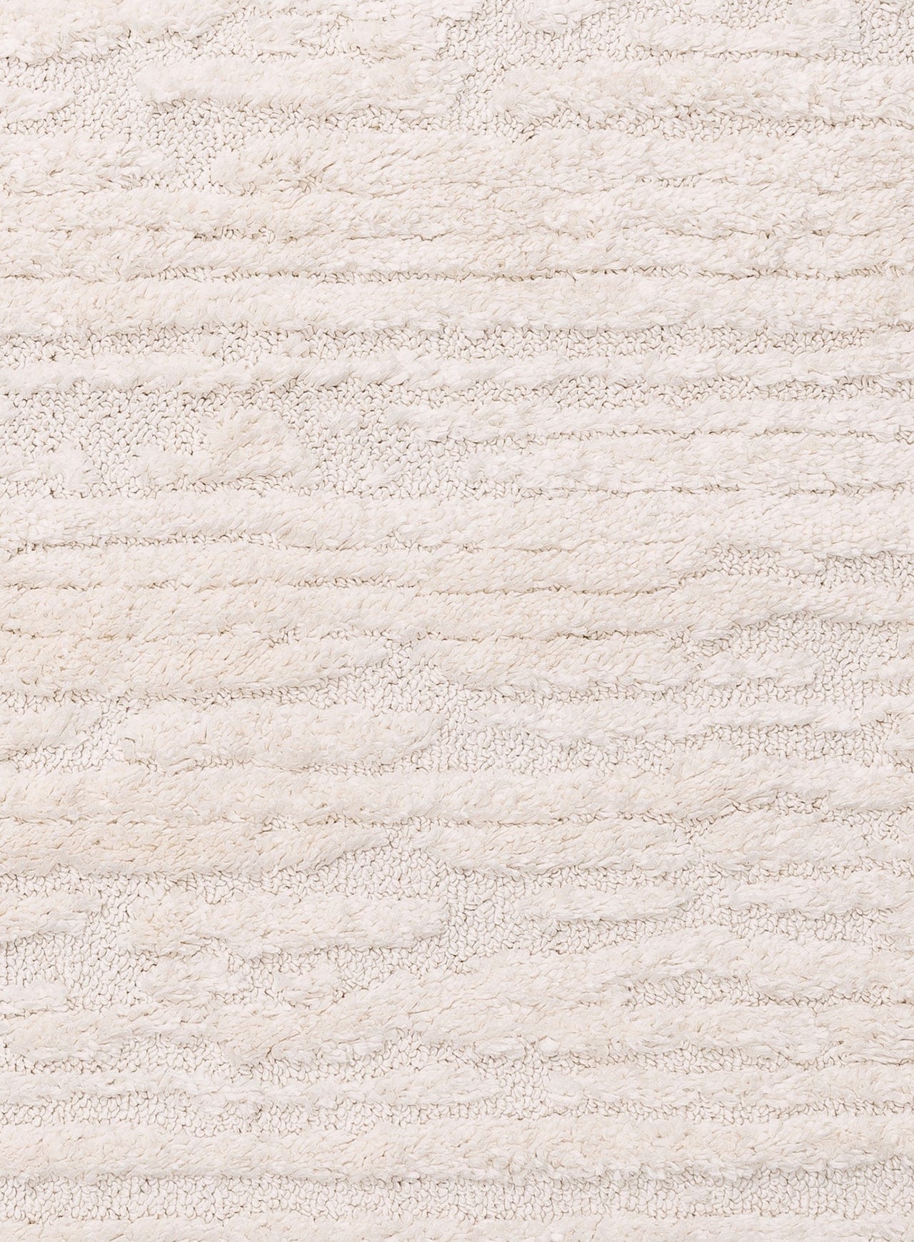 Serena Ivory Cream Textured Tassel Rug